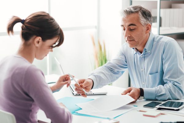 Financial advisor meeting with a client to build a divorce financial planning specialty